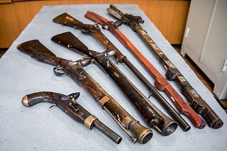 Employees of the TSU Museum restoring past of old guns